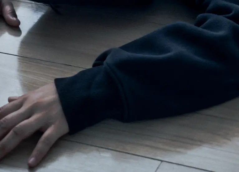 Person laying on the floor